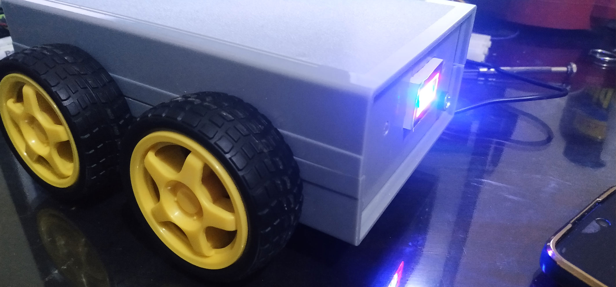 Robot car is controlled by a smartphone through wi-fi